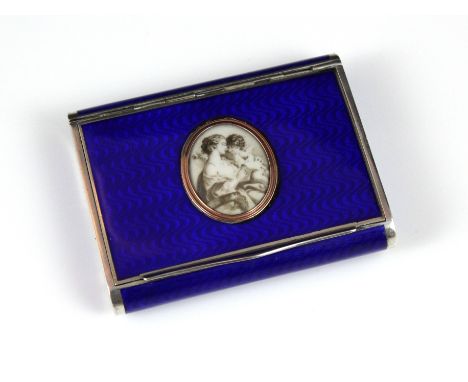 An antique early 20th Century Sterling Silver cigarette case, London import marks, rounded rectangular form the body covered 
