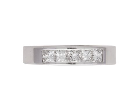 A diamond half eternity ring in 18ct white gold, set with a panel of five princess cut diamonds totalling approximately 0.63c