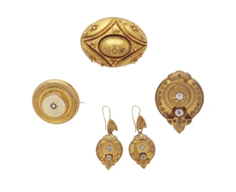 An antique yellow metal brooch set with white paste stones, together with a similar pair of earrings, and two other antique b