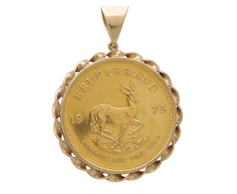 A Vintage Gold Krugerand pendant the coin dating from 1973, within a 9ct yellow gold rope twist mount. Length 5cm / 2". Total