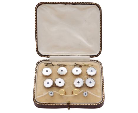 An antique Art Deco gentlemanâ€™s dress set in 9ct yellow gold, comprising four shirt buttons, a pair of cufflinks and a pair