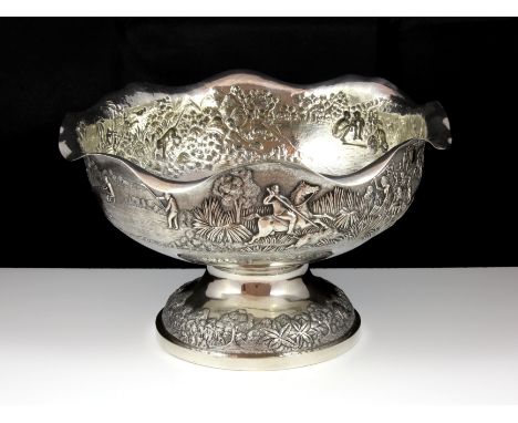 An antique late 19th Century Colonial Indian Silver bowl, Calcutta c1890. Of circular form with a wavy edge, the body decorat