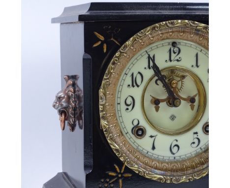 A late 20th century Ansonia Clock Co black painted cast-iron 8-day mantel clock, enamel dial with painted Arabic numerals and