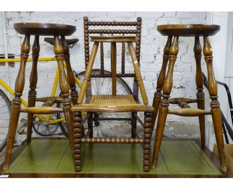 A pair of elm stools, a cane and bobbin turned chair, and a small stool (4) 