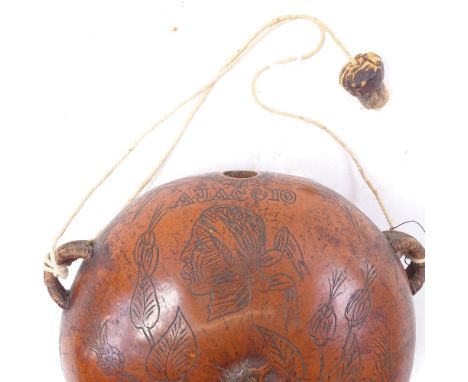 A 19th century Corsican gourd flask, hand engraved decoration, with original cork stopper, and inscribed Ajaccio, height 14cm