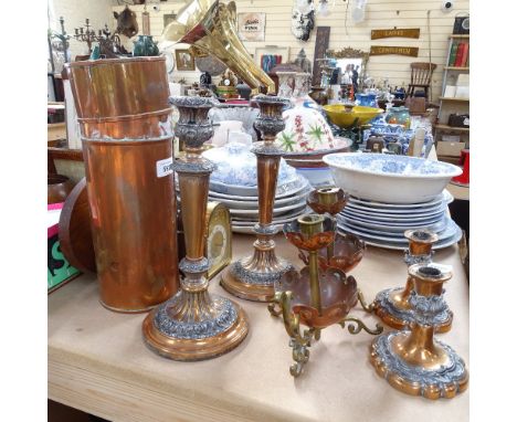 A copper canister with glass dishes, 3 pairs of candlesticks, tallest 29cm, a clock and a barometer 