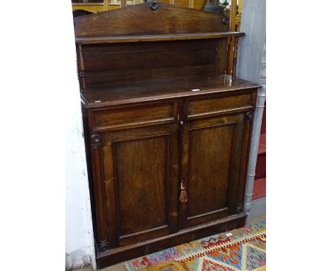 A Regency rosewood chiffoniere, with raised shelf-back, drawer and cupboards under, W93cm, H136cm 