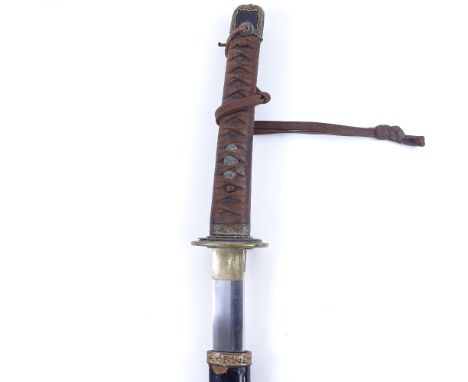 A Second War Period Japanese Officer's katana sword, in black lacquered scabbard, blade length 65cm 