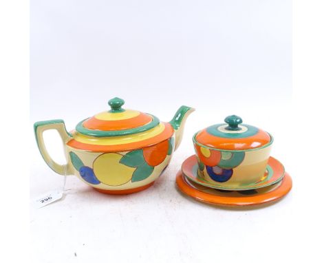 A 1930s Pearl Pottery Art Deco painted teapot, and similar sugar bowl and cover on stand, by Edith Best 