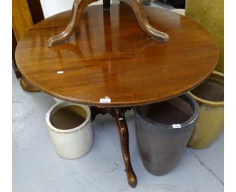 A Georgian mahogany tilt-top table, on tripod base. W103cm