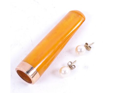 A amber and 9ct gold mounted cigarette holder, in original case, and a pair of 9ct gold and pearl set earrings 