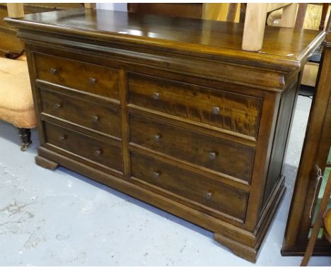 An Indonesian hardwood chest of 6 drawers on bracket feet, W138cm, together with a pair of matching 2-drawer bedside chests 