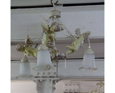 A composite 3-branch light fitting with cherub supports 