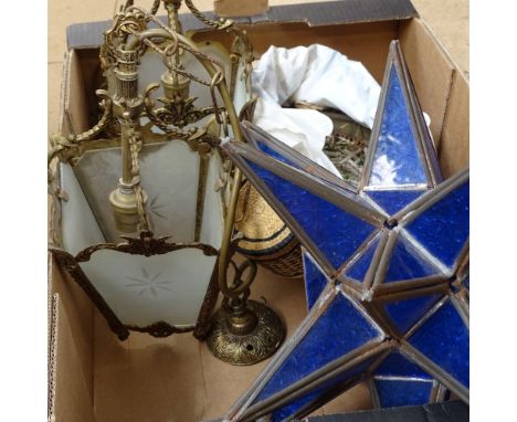 A pair of brass-framed ceiling lights, a blue star lamp etc 