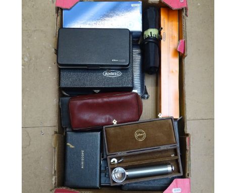 A Vintage cased ophthalmic instruments, auriscope etc 