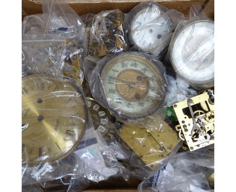 A box of Vintage clock dials, mechanisms etc 