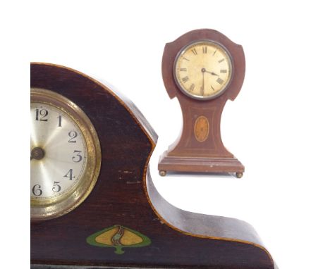 An Edwardian inlaid mahogany-cased mantel clock, height 25cm, and a stained wood-cased clock (2) 