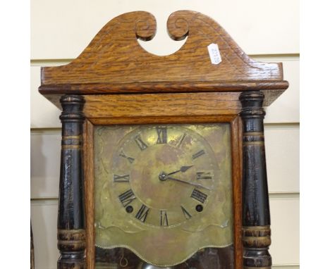 An oak-cased 8-day striking wall clock 