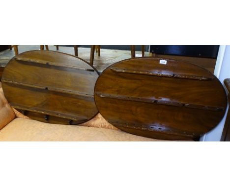 A pair of stained beech oval pipe racks 