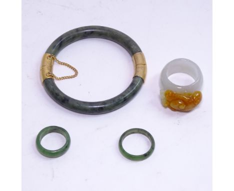 A jade bangle &amp; 3 jade rings 
