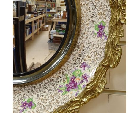 A Burleigh Ware floral decorated ceramic wall mirror, in cast-brass surround, diameter 48cm 