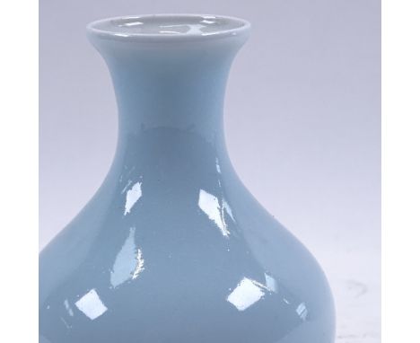 A Chinese light blue porcelain narrow-neck vase, seal mark on base, height 13cm 