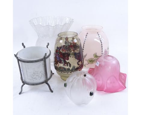 A group of decorative glass light shades, a cylindrical lipothene lamp in metal stand 