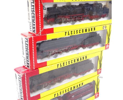 3 Fleischmann HO gauge model railway locomotives and tenders, and a Fleischmann pair of passenger carriages, all boxed 
