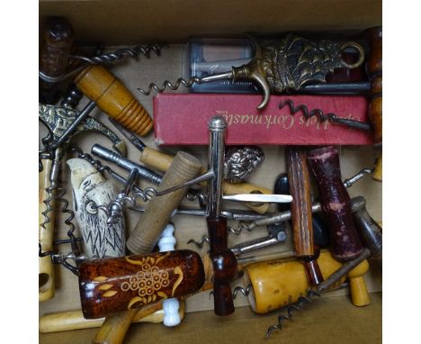 A box of Vintage corkscrews 