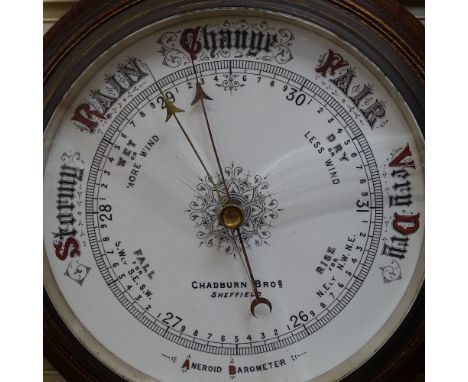 A Vintage oak-cased wheel aneroid barometer, by Chadburn Brothers of Sheffield, height 88cm 