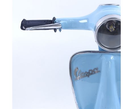 A modern novelty painted metal Vespa moped front table lamp, height 33cm 