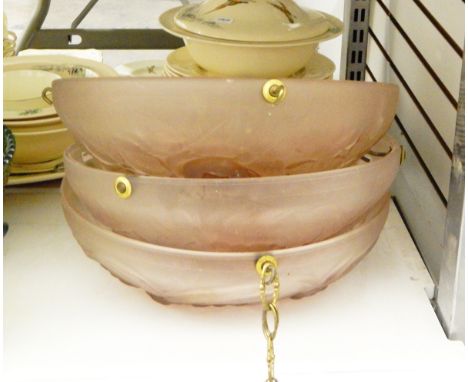 Pair of frosted pink glass plafonnier ceiling lights of circular form with moulded bird decoration, 34cm diameter and a simil