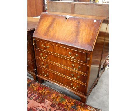Mahogany bureau with fitted interior, four long graduated drawers below, on bracket feet, width 75cm 