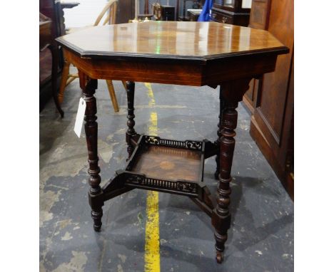 Edwardian rosewood octagonal top occasional table with under-shelf, on ring turned legs with castors, 75cm 