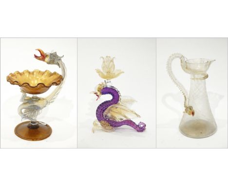 Venetian glass jug with gold decoration, the handle modelled as a dragon, a copper glass comport, the opalescent stem modelle