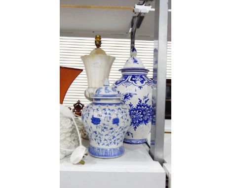 Chinese-style porcelain baluster vase with scrolling flowers and foliage, in underglaze blue, a continental blue and white la