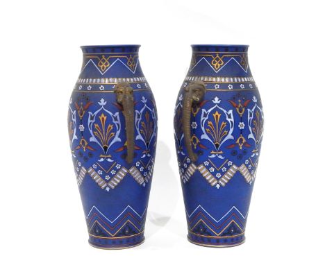 Pair of Mettlach baluster-shaped vases of matt blue ground with incised gilt and enamel Eastern-style decoration, having elep