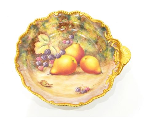 20th century Royal Worcester porcelain plate of circular shaped form with shell handle, gilt gadrooned and shell border, hand