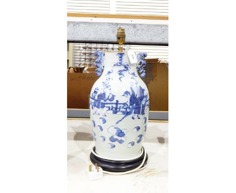 Oriental blue and white jar, adapted to a table lamp showing a wise man and his acolytes (af)  