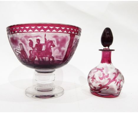 Large glass pedestal bowl, the amethyst glass outer layer acid etched to reveal panels of classical figures within a chevron 