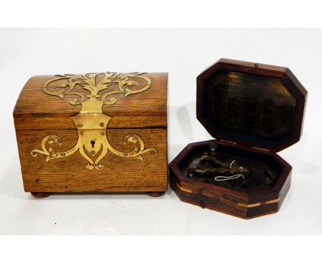 Oak dome-topped box with pierced brass mounts, a decorative hardwood box, an oak desk stand with moulded glass inkwells and a