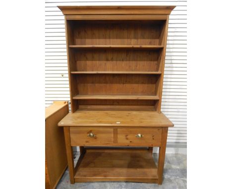 Modern stained pine kitchen dresser with open shelf plate rack, two frieze drawers, with pot board below, on square supports,