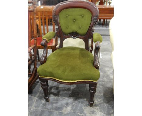 Victorian mahogany balloon-back open armchair with buttoned panel to back, padded arms, upholstered stuffover seat, on turned