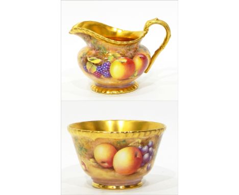 20th century Royal Worcester china jug of oblate baluster form with gilt handle and gadrooned rim and base, fruit decorated b