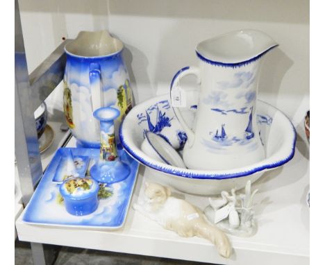 Pottery jug and bowl set, further toilet jug and dressing table set together with a Nao porcelain model of a cat and another 