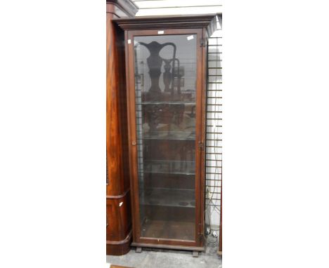 Glazed oak display cabinet with straight moulded cornice, glazed panel sides and door enclosing glass shelves, on block feet,