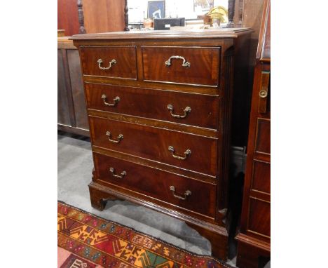 Small mahogany chest of two short and three long graduated drawers, on bracket feet, 61cm 