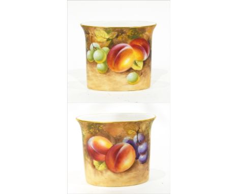 Pair of mid 20th century Royal Worcester porcelain cigarette holders, gilt rim, handpainted with fruit, signed indistinctly, 