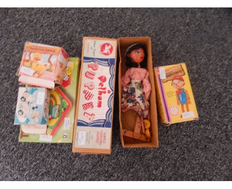 Pelham puppet with original box 'Simple Dancing Puppet', Abenteuer Pinocchio, boxed, a cat in the same range, unboxed and 'Gi