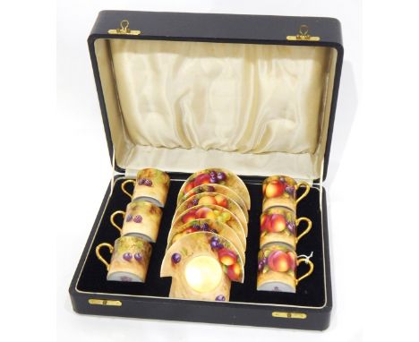 Early 20th century Royal Worcester porcelain coffee set, boxed, comprising six coffee cans and saucers, handpainted with frui